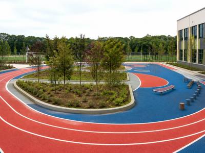 Red rubber running track at a school